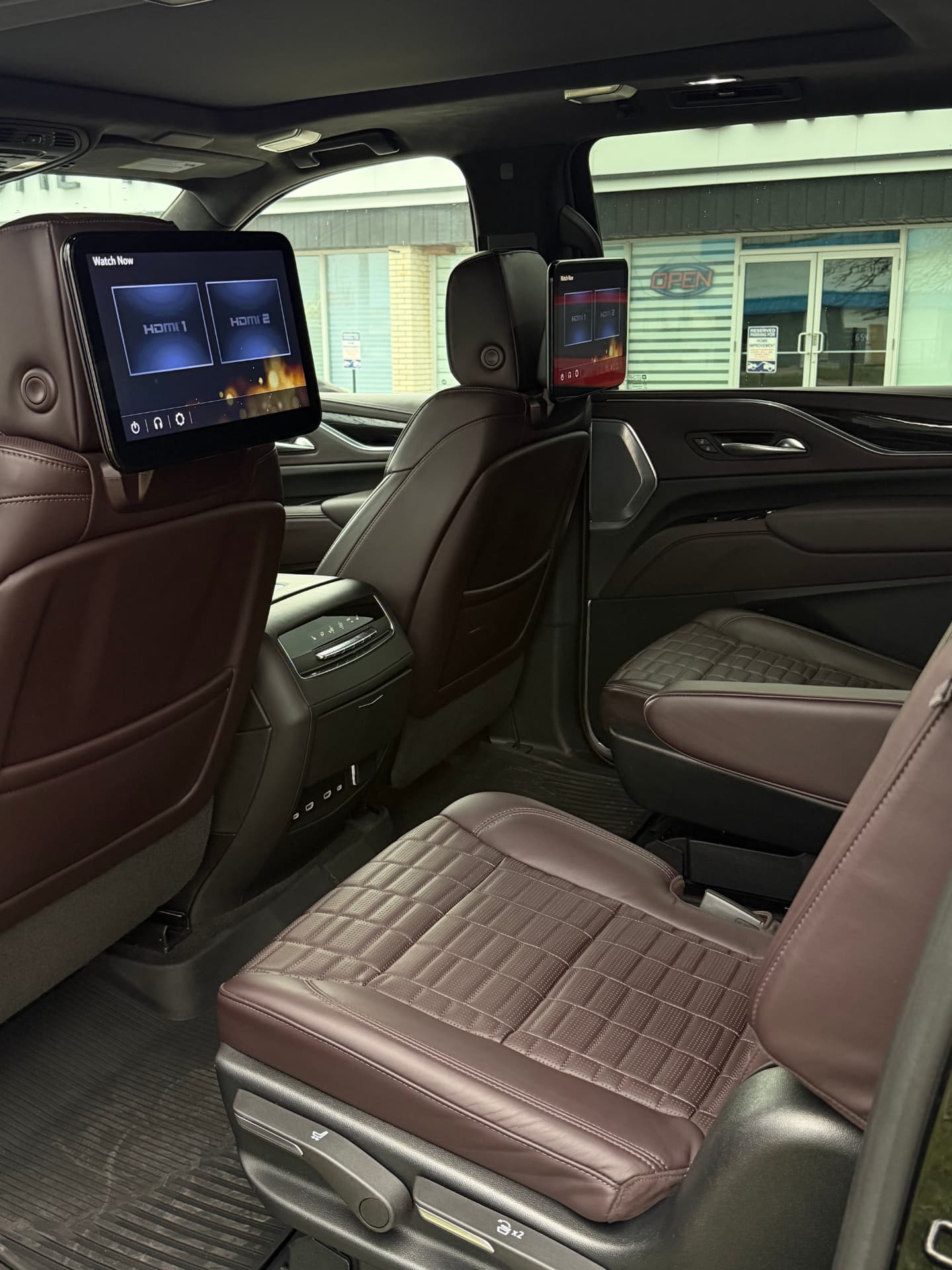 Cadillac Escalade rear cabin with entertainment screens