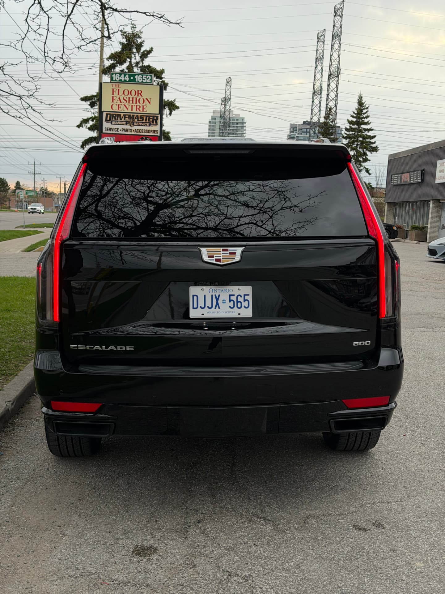 Black Cadillac Escalade ESV rear view