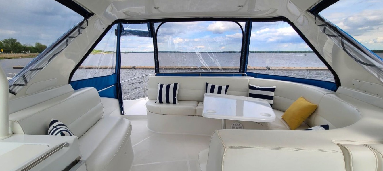 Bright white leather cockpit seating on the 60ft Carver yacht